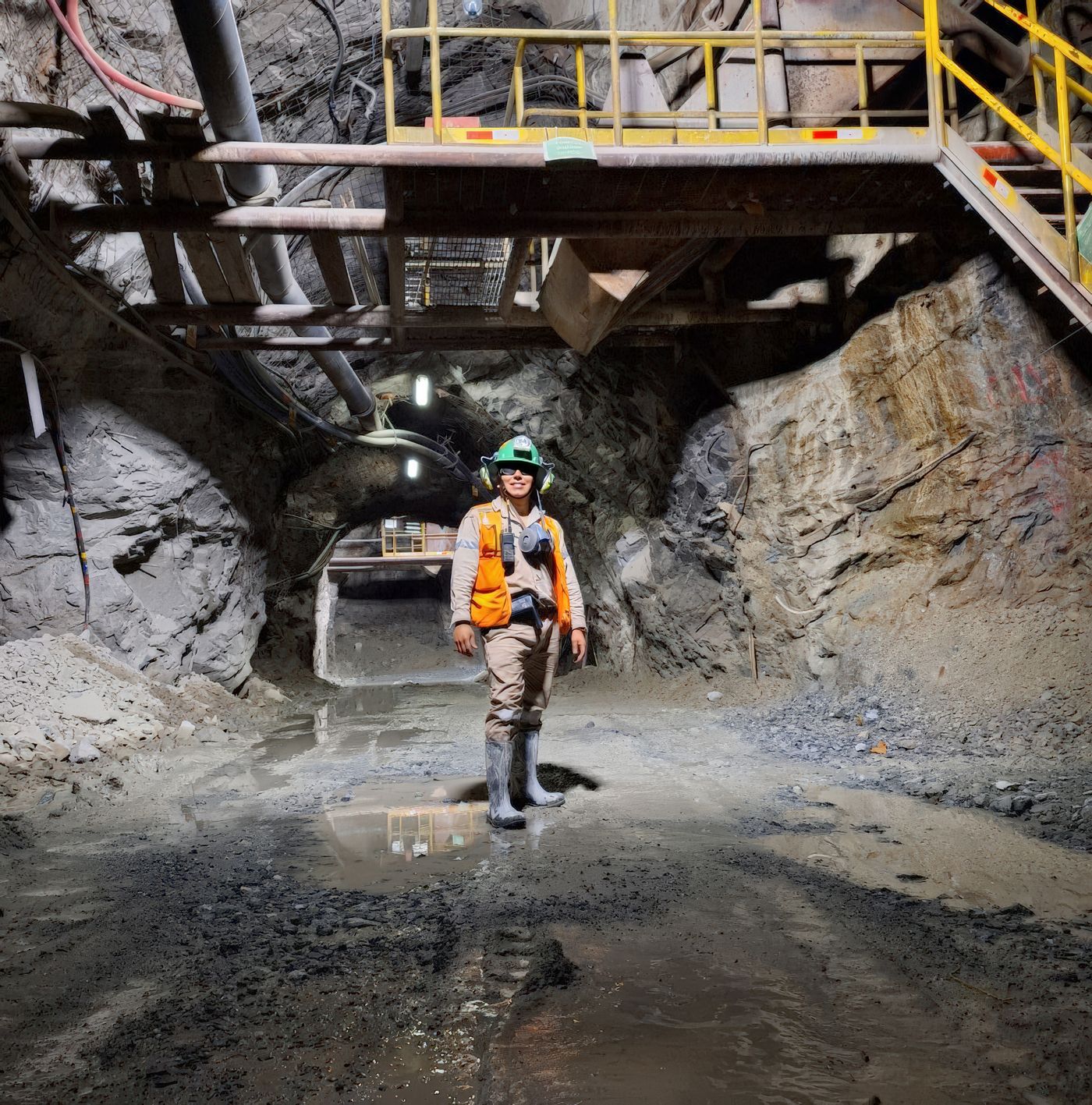 Mine engineer reviewing an AI-generated safety report on a tablet